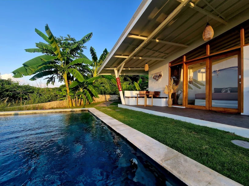 Villa infinity pool overlooking the valley toward Mount Agung